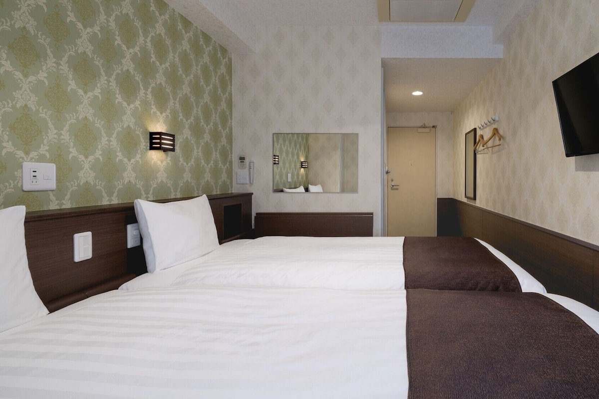 Desk, iron/ironing board (on request), WiFi (free), bed sheets