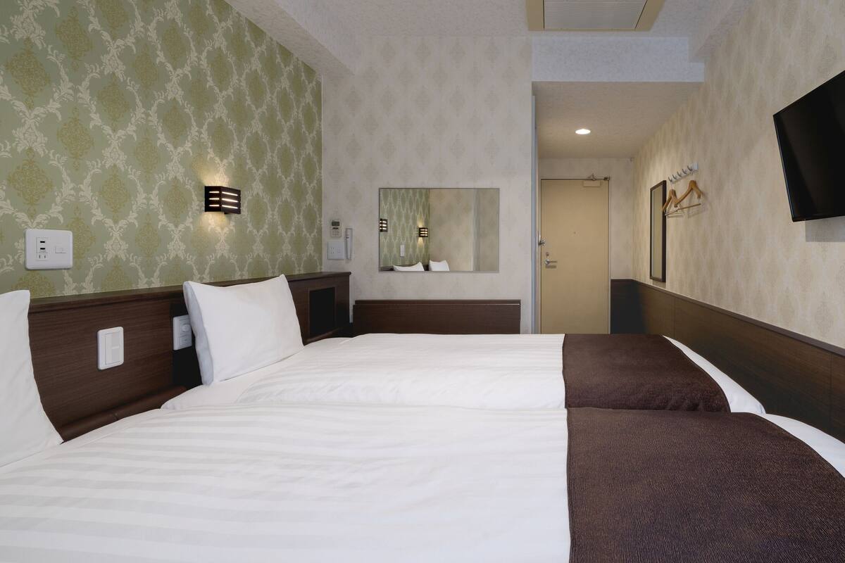 Desk, iron/ironing board (on request), WiFi (free), bed sheets