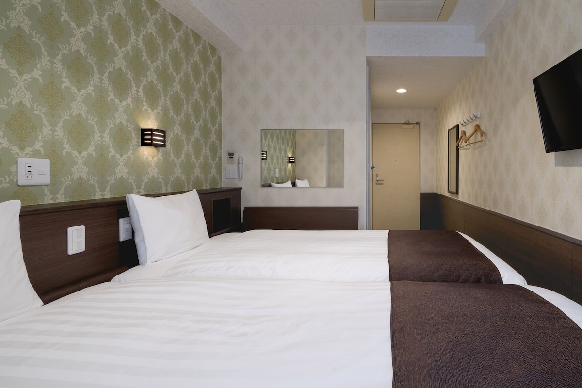 Desk, iron/ironing board (on request), WiFi (free), bed sheets