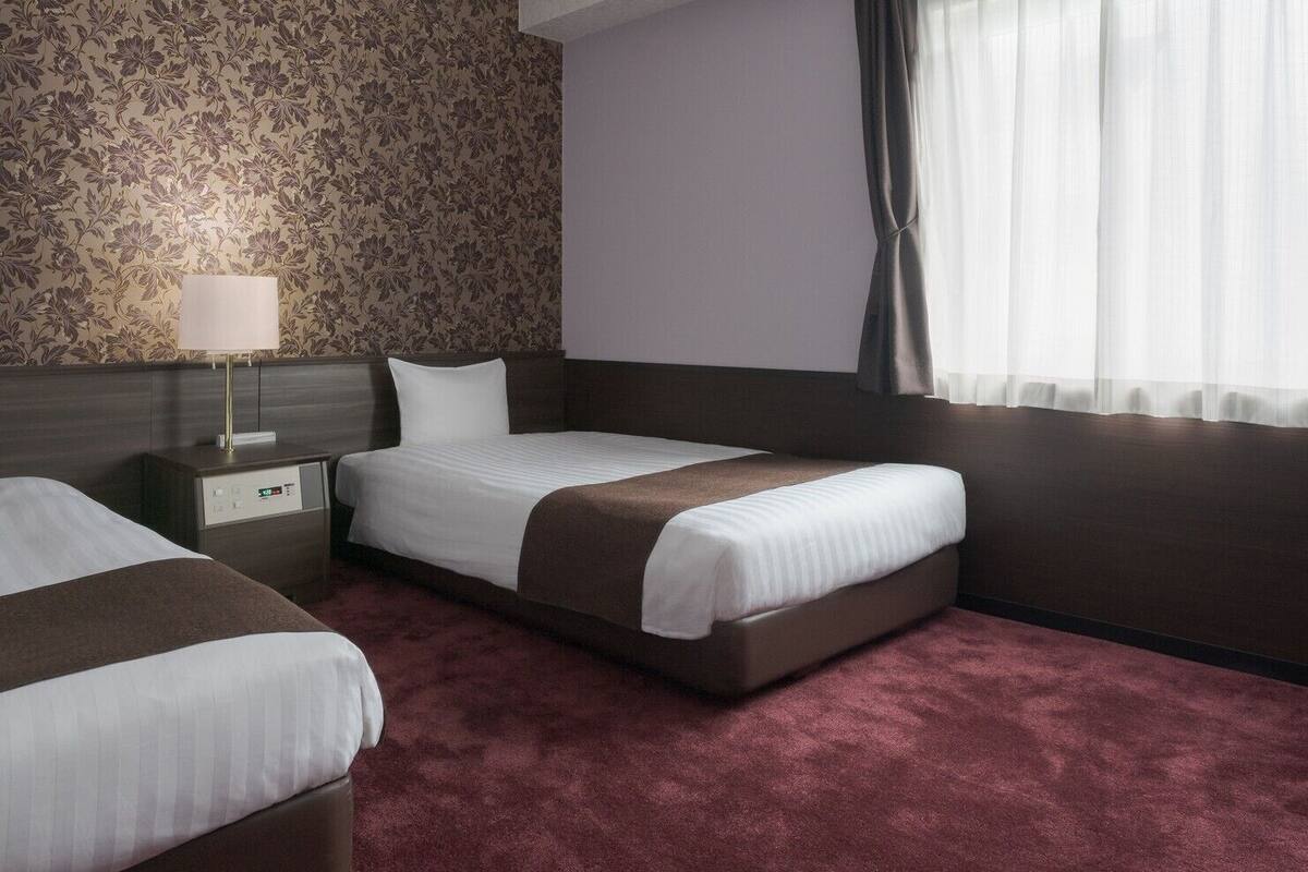 Desk, iron/ironing board (on request), WiFi (free), bed sheets