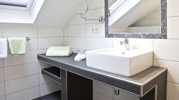 Shower, free toiletries, hair dryer, towels