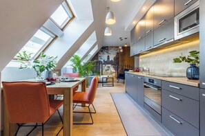 高级公寓, 1 间卧室, 简易厨房 | 客房内用餐