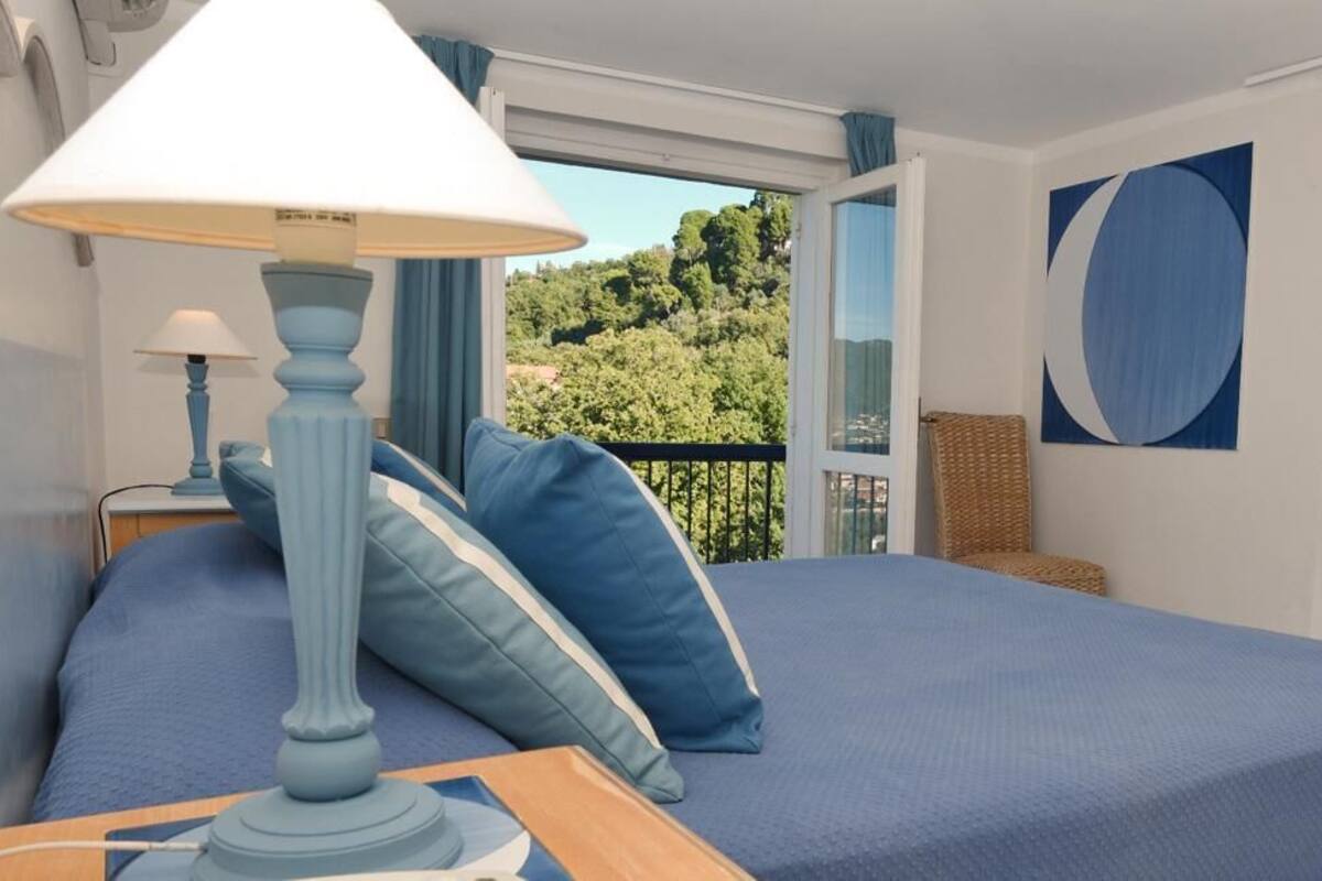 standard double or twin room, hill view | minibar, in-room safe, blackout curtains, iron/ironing board