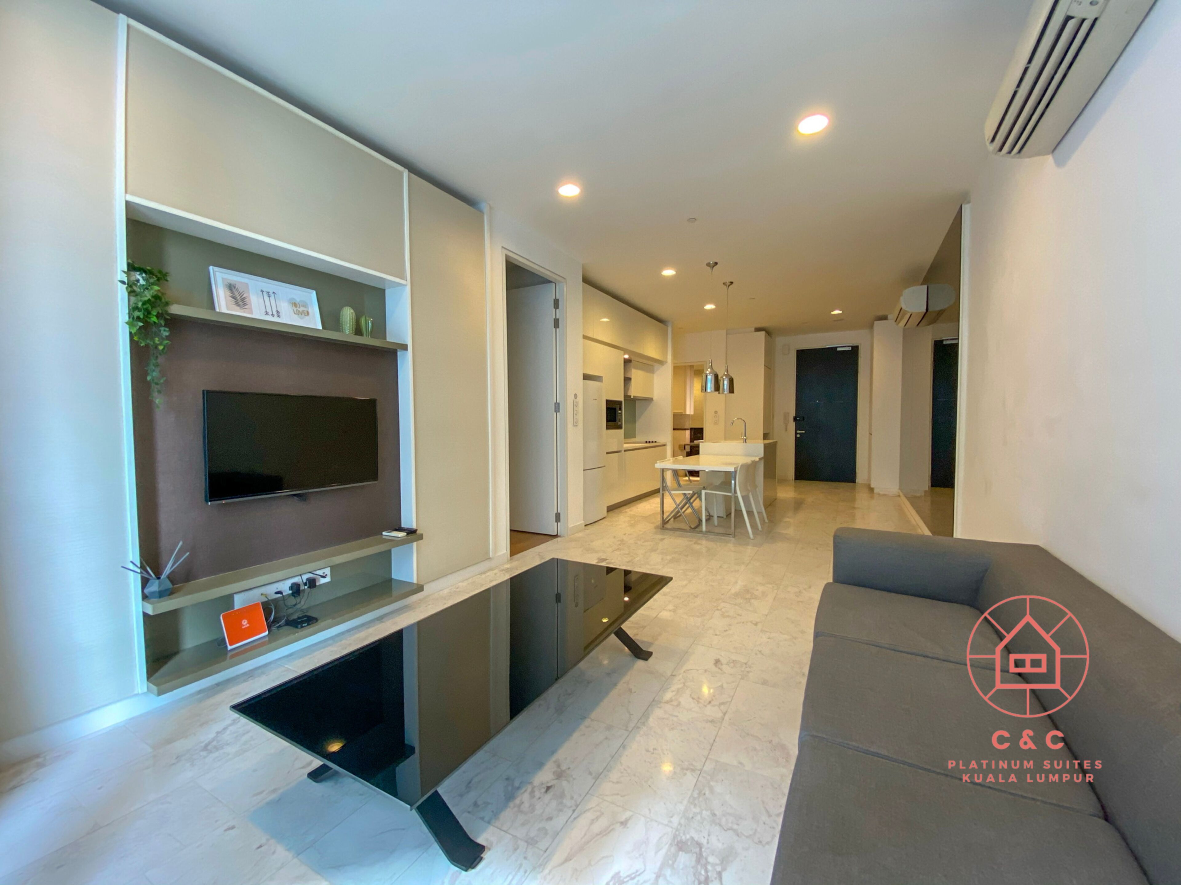 Premium Suite, 2 Bedrooms | Living area | 40-inch LCD TV with digital channels, TV, streaming services