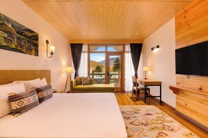 Deluxe King Room | Biancheria da letto di alta qualità, una cassaforte in camera