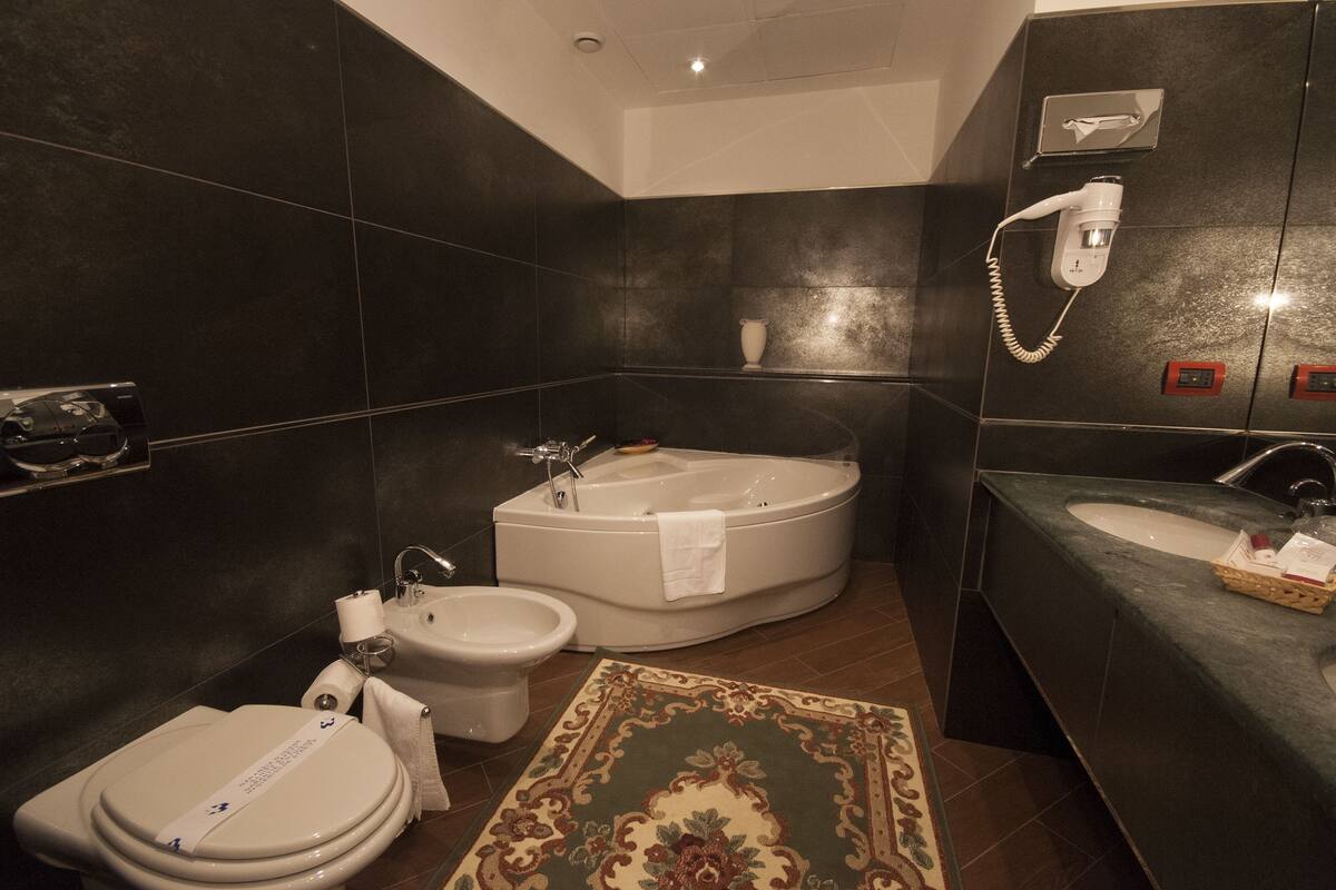 suite | bathroom | hair dryer, towels