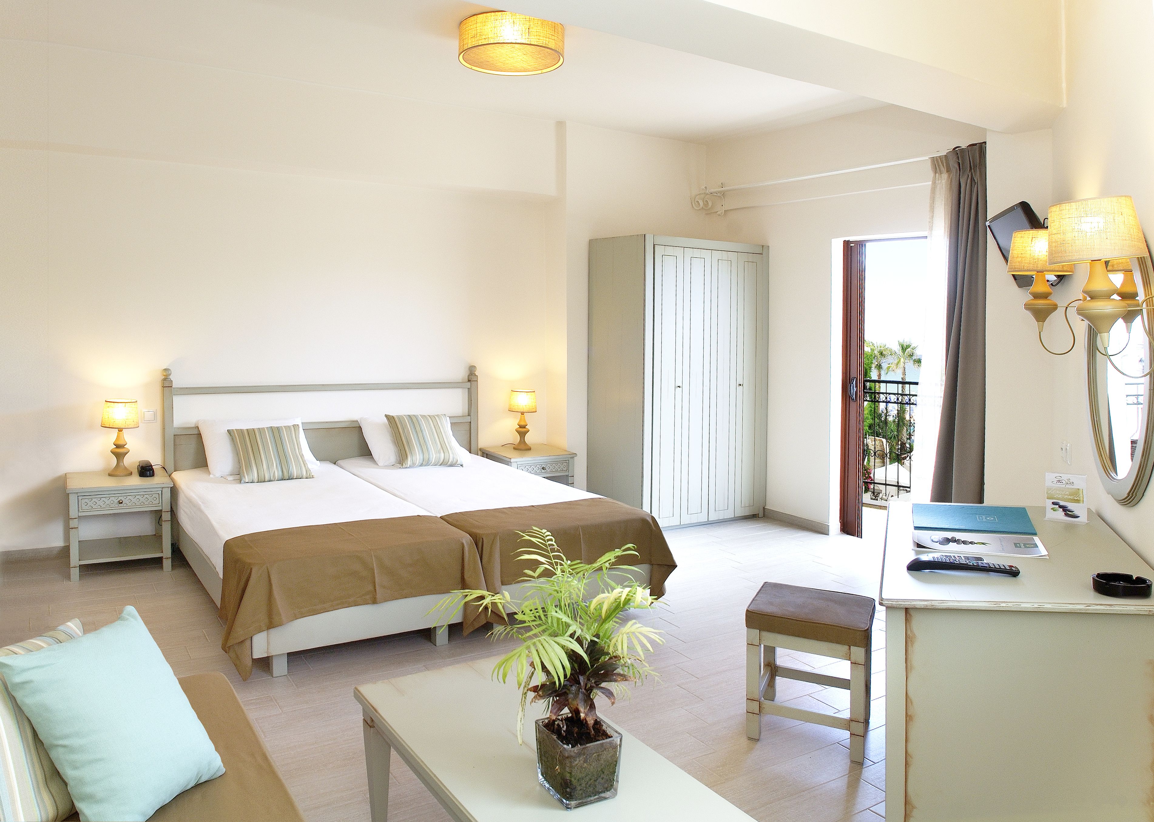 double or twin room, balcony, sea view in almyrida beach hotel | desk, laptop workspace, blackout curtains, iron/ironing board