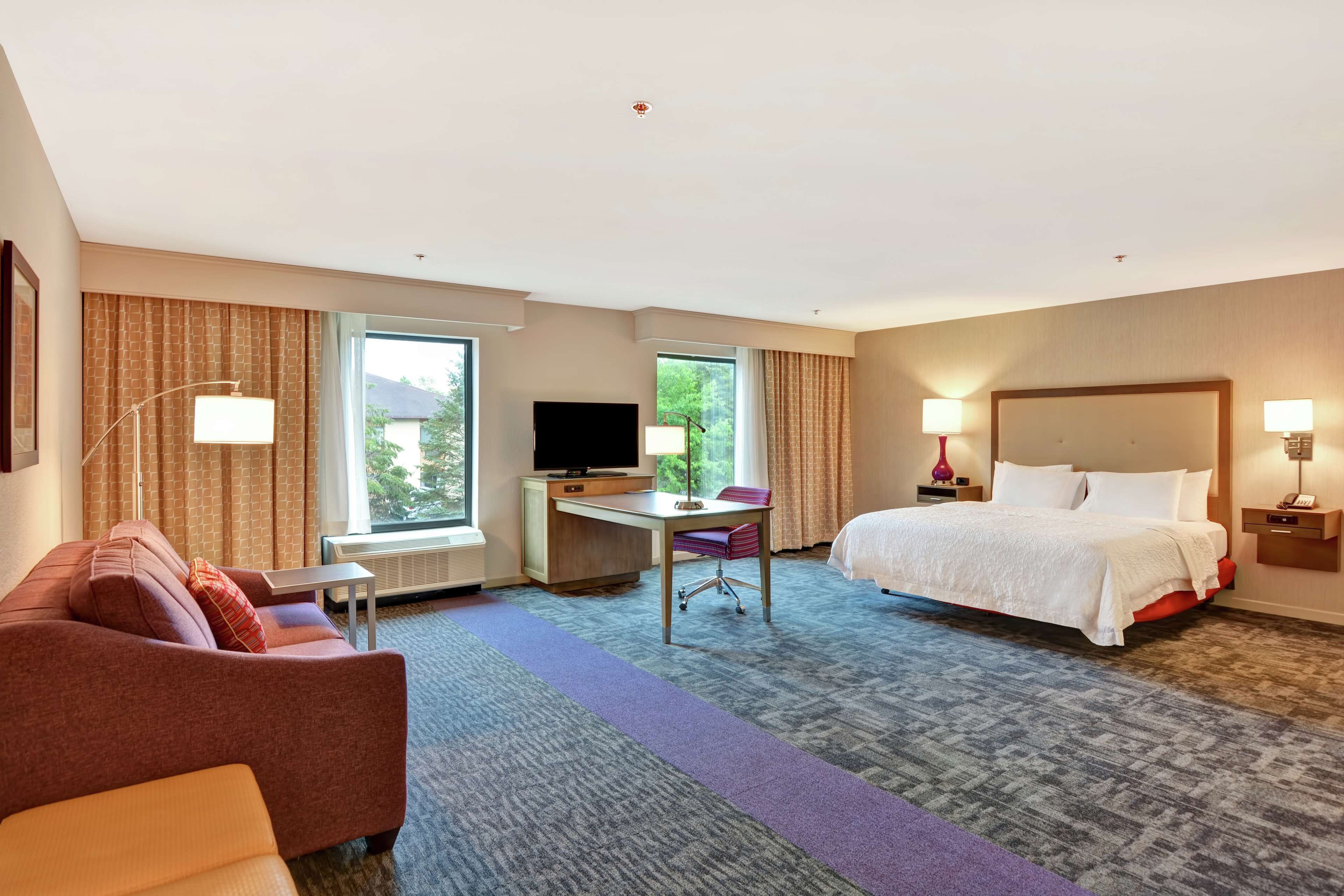 desk, laptop workspace, blackout curtains, iron/ironing board