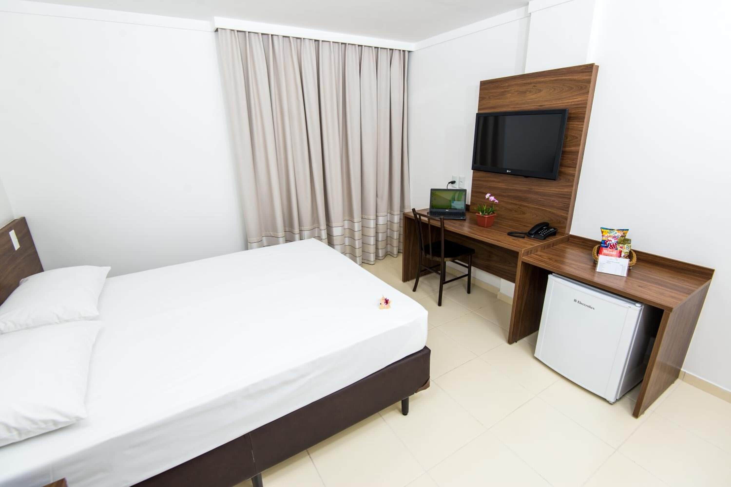 minibar, desk, blackout curtains, rollaway beds