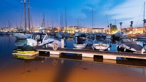 A marina at dusk with multiple boats docked. - Coastal Retreat with Private Pool (Odiaxere)