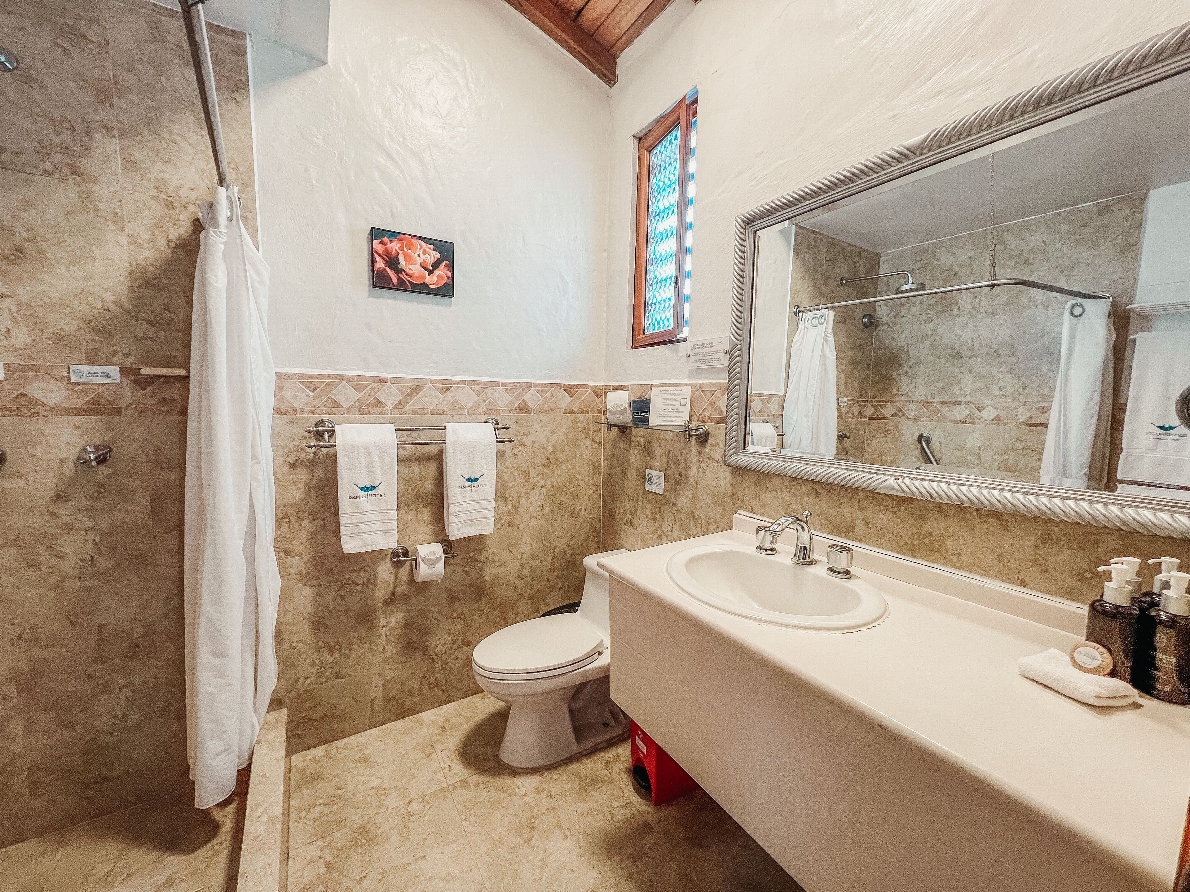 shower, rainfall showerhead, designer toiletries, hair dryer