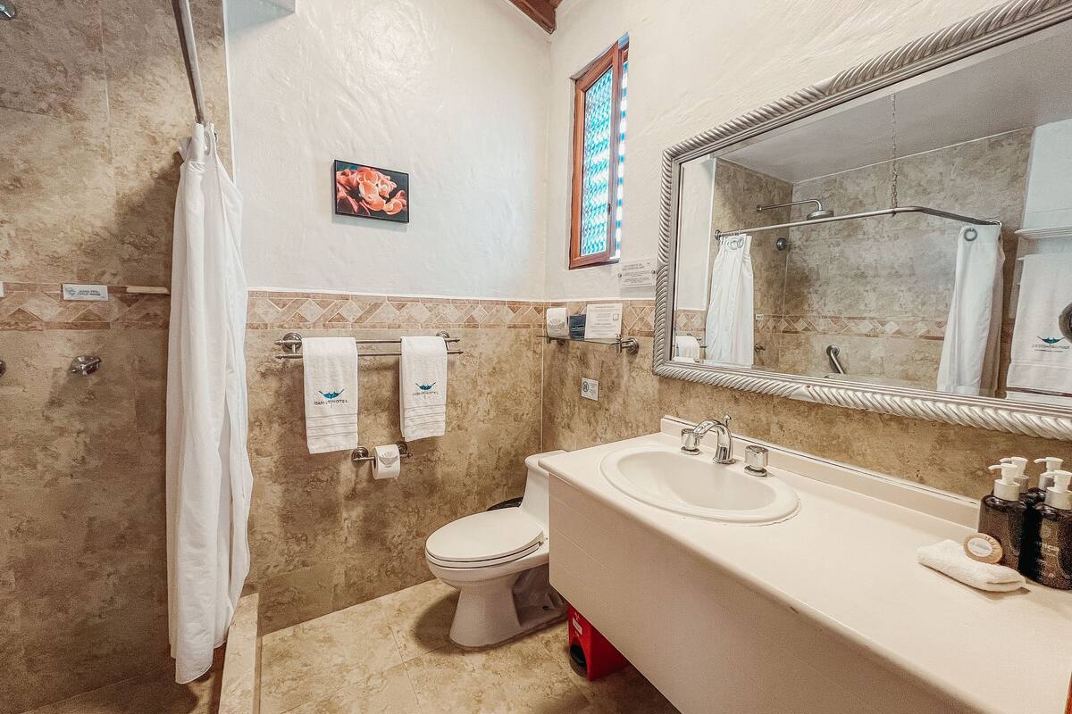 shower, rainfall showerhead, designer toiletries, hair dryer