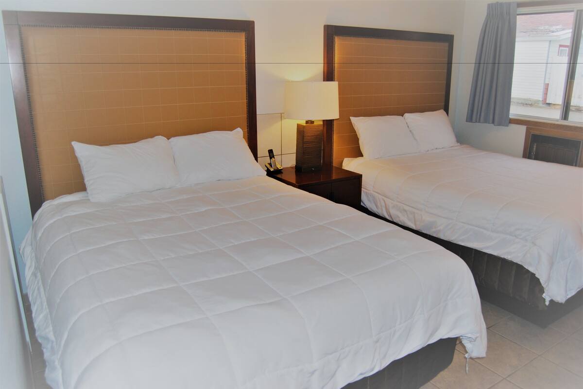 Premium bedding, desk, blackout curtains, iron/ironing board