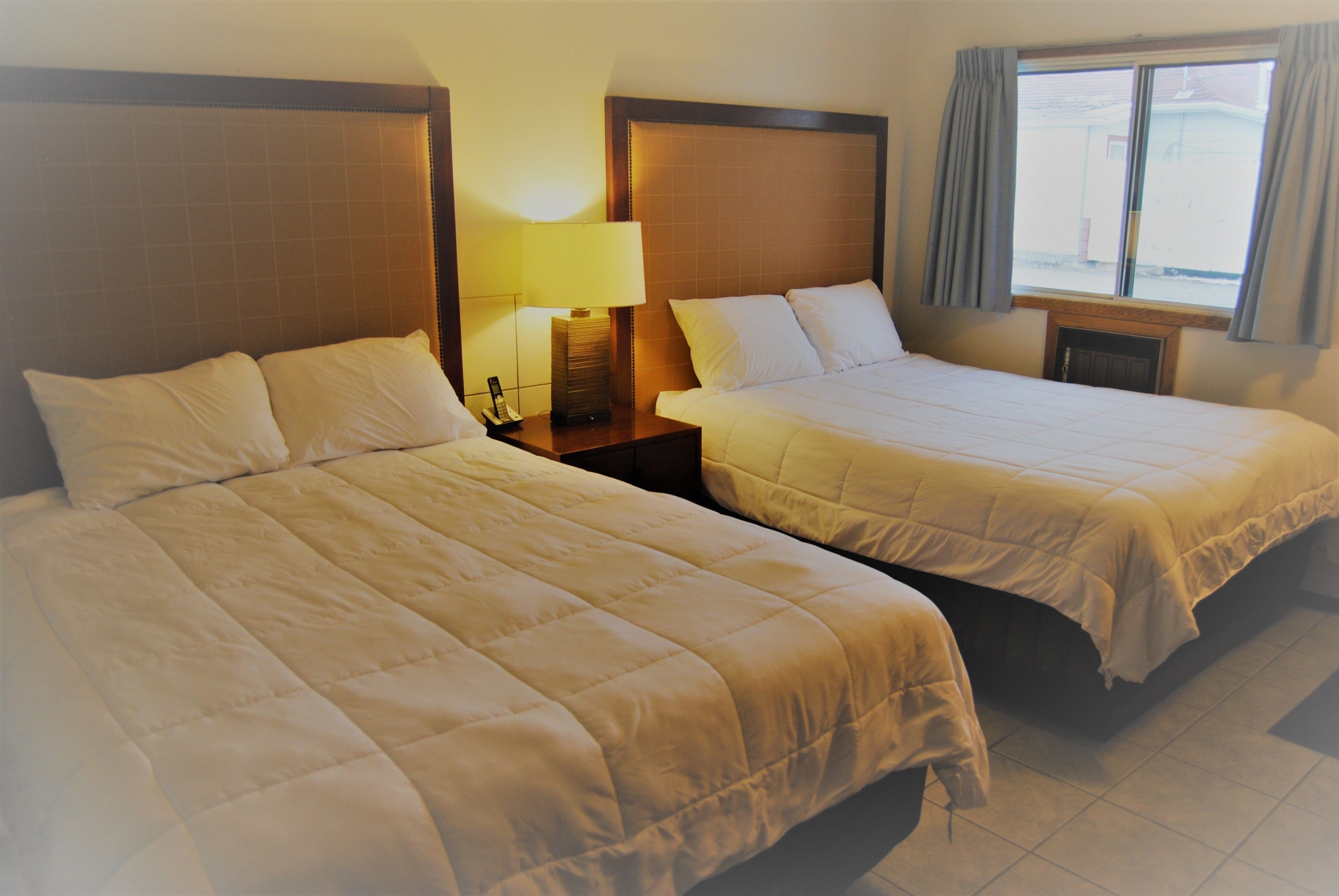 Premium bedding, desk, blackout drapes, iron/ironing board