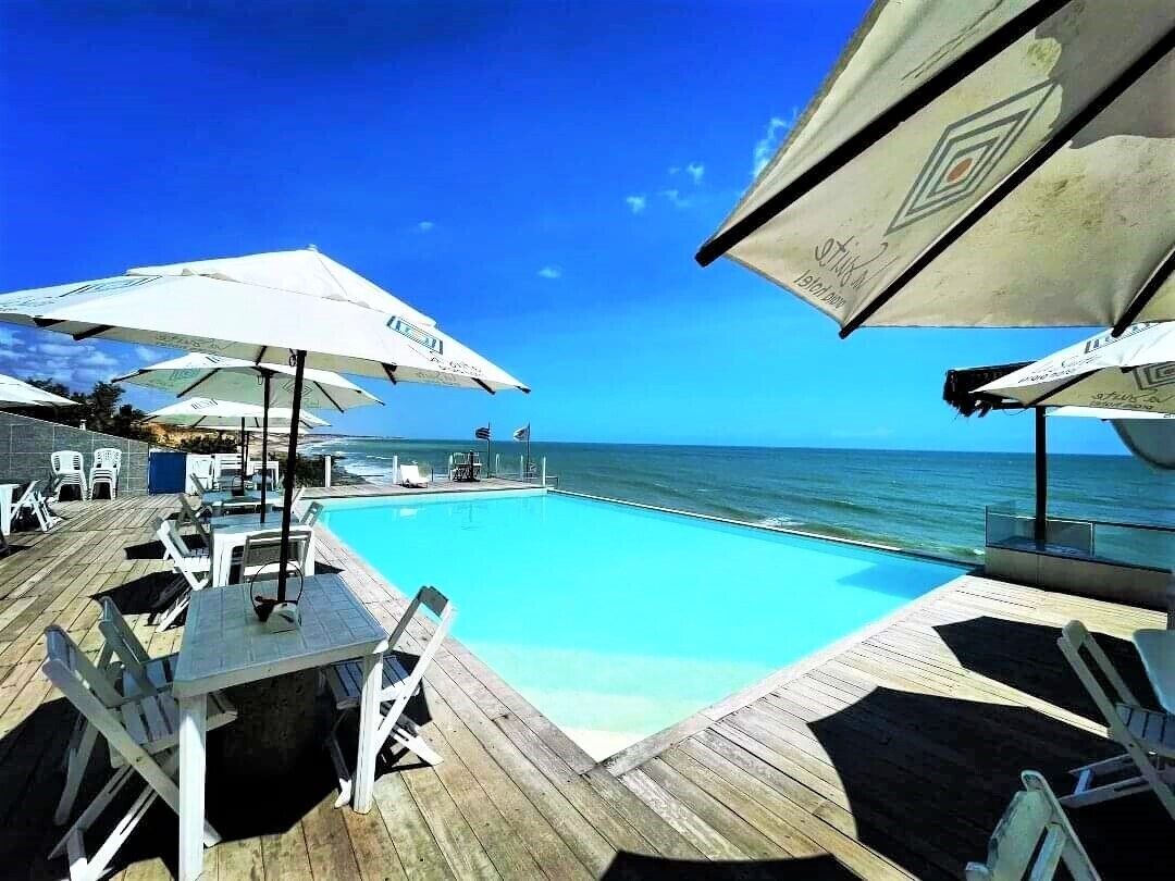 4 outdoor pools, open 9:00 AM to 9:30 PM, pool umbrellas, sun loungers