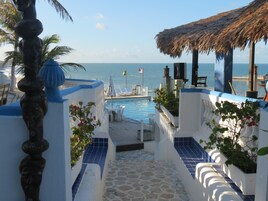 4 outdoor pools, open 9:00 AM to 9:30 PM, pool umbrellas, sun loungers
