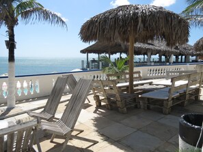 4 outdoor pools, open 9:00 AM to 9:30 PM, pool umbrellas, pool loungers