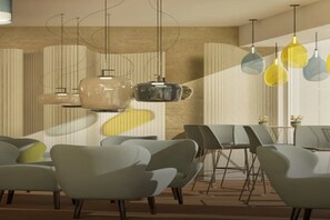 A modern interior with contemporary furniture and pendant lighting. - Hotel Castello (L'Aquila)