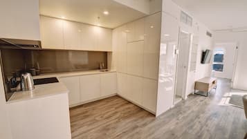 Apartment, 2 Bedrooms | Private kitchen | Fridge, microwave, oven, stovetop