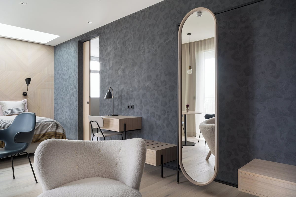 junior suite | in-room safe, desk, soundproofing, iron/ironing board