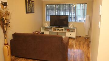 Family Apartment, 2 Bedrooms | Living area | Flat-screen TV