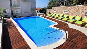 Outdoor pool, open 9:00 AM to 9:00 PM, free cabanas, sun loungers