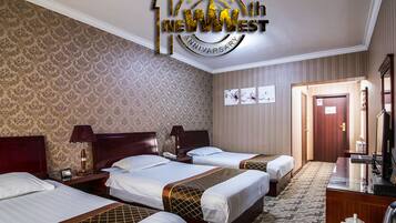 Standard Triple Room | Select Comfort beds, minibar, in-room safe, desk