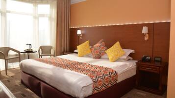 Colchones Select Comfort, minibar y caja de seguridad en la habitación