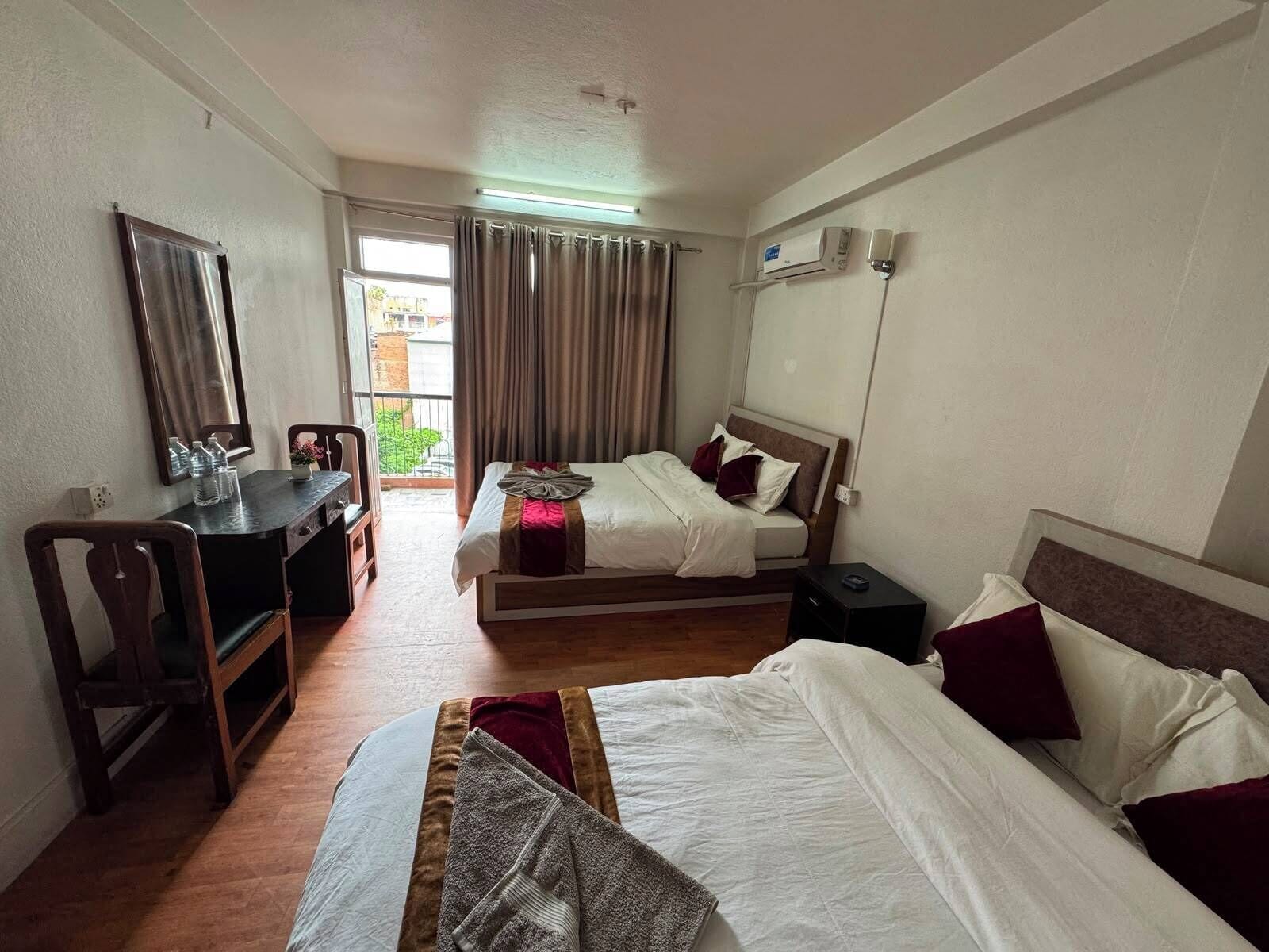 Comfort Room, Multiple Beds, Garden View | In-room safe, desk, laptop workspace, WiFi (free)
