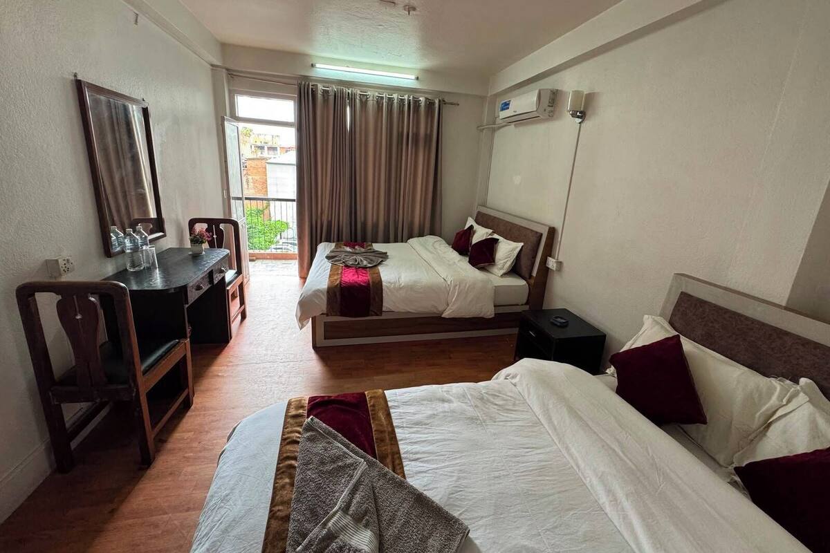 Comfort Room, Multiple Beds, Garden View | In-room safe, desk, laptop workspace, WiFi (free)