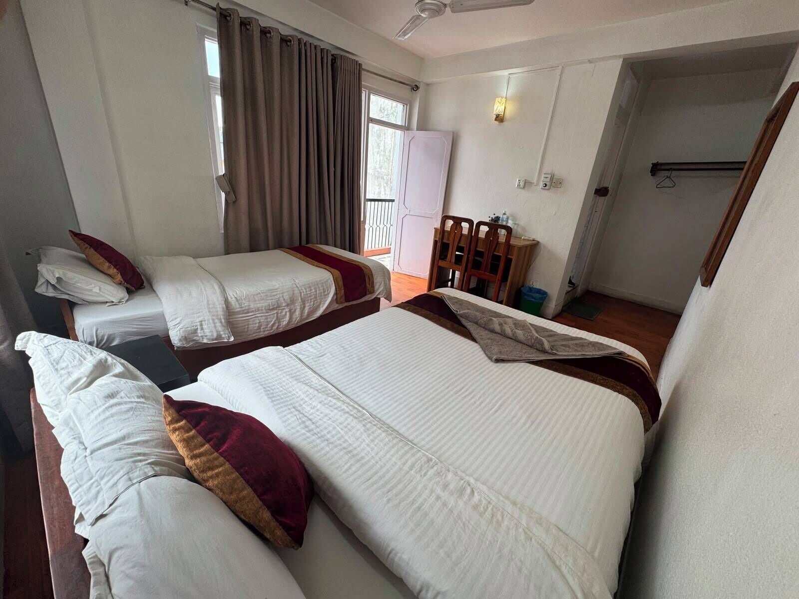Standard Double or Twin Room, 2 Bedrooms, Smoking, City View (Deluxe Double Room with Private Bathr) | In-room safe, desk, laptop workspace, WiFi (free)