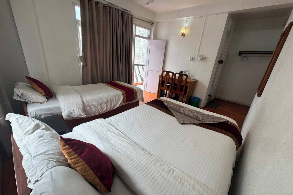 Standard Double or Twin Room, 2 Bedrooms, Smoking, City View (Deluxe Double Room with Private Bathr) | In-room safe, desk, laptop workspace, WiFi (free)