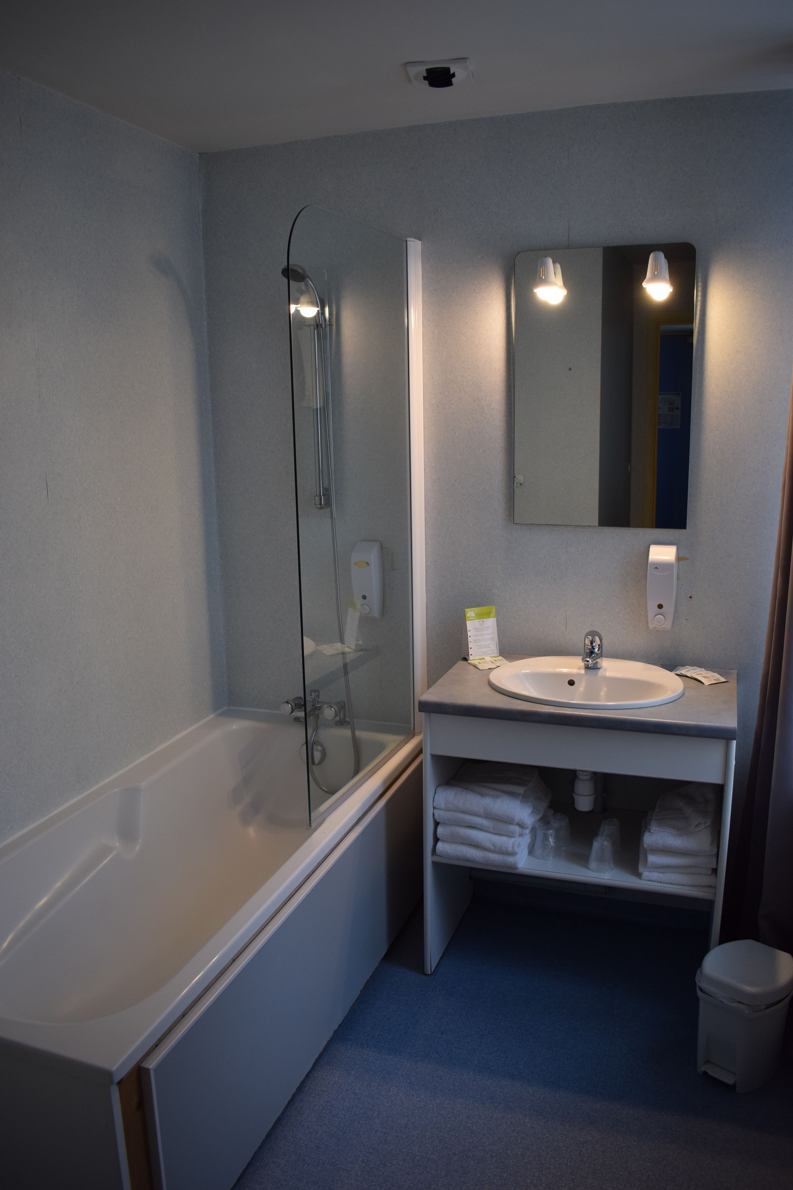 family quadruple room, multiple beds | bathroom | free toiletries, hair dryer, towels