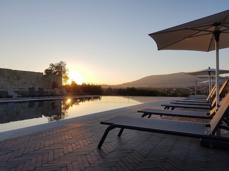 Seasonal outdoor pool, pool umbrellas, sun loungers