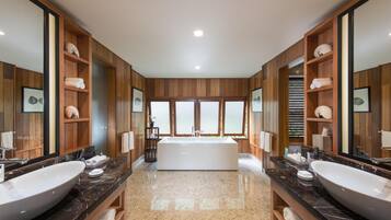 Separate bathtub and shower, rainfall showerhead, free toiletries