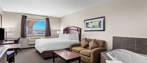 Suite, 1 cama de matrimonio grande, no fumadores, bañera de hidromasaje (2nd Floor) | Escritorio y espacio para trabajar con un portátil