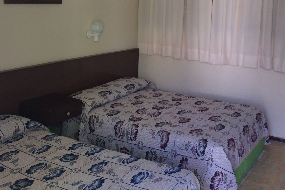 Standard Quadruple Room | In-room safe, bed sheets