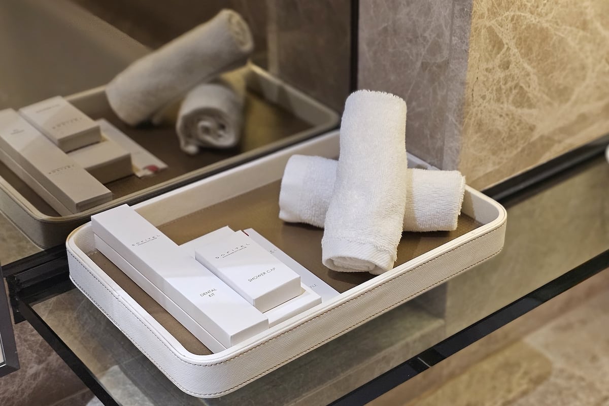 separate bathtub and shower, designer toiletries, hair dryer, bathrobes