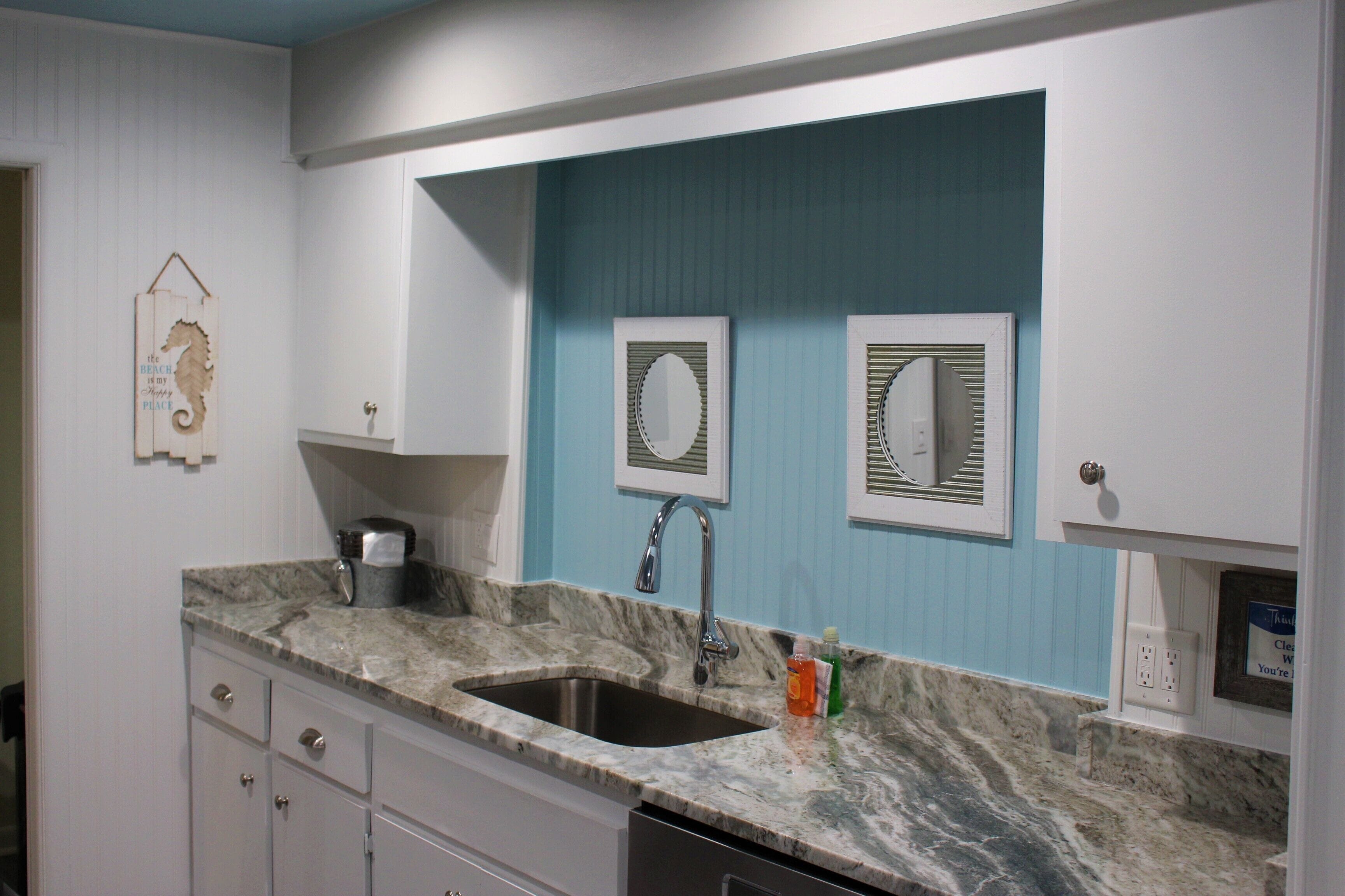 superior suite, kitchen, pool view | private kitchen | fridge, microwave, coffee/tea maker, toaster