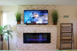 Superior Suite, Kitchen, Pool View | Living area | TV