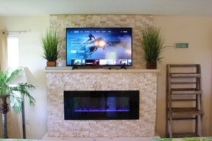 Superior Suite, Kitchen, Pool View | Living area | TV