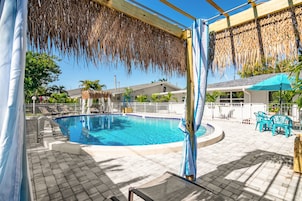 Outdoor pool, open 8:00 AM to 6:00 PM, free cabanas, pool umbrellas