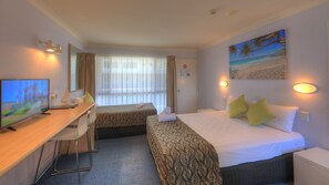 Premium bedding, desk, laptop workspace, free WiFi
