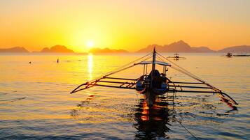 On the beach, free beach cabanas, sun-loungers, beach towels