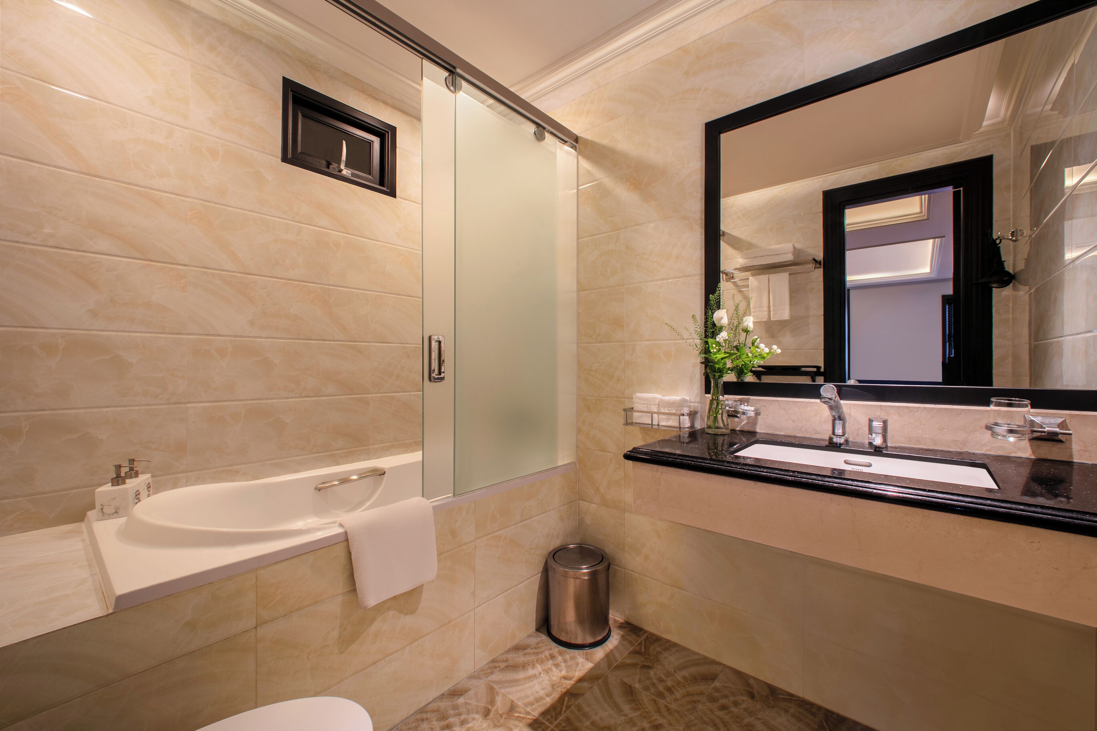 deluxe twin room - no window - no view | bathroom | designer toiletries, hair dryer, bathrobes, slippers