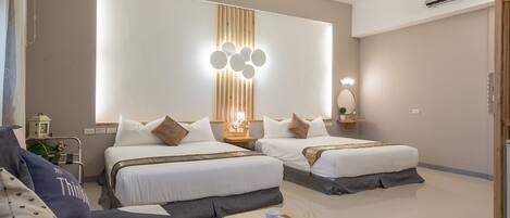 Deluxe Quadruple Room, 2 Double Beds, Accessible, Balcony | Premium bedding, blackout drapes, soundproofing, free WiFi