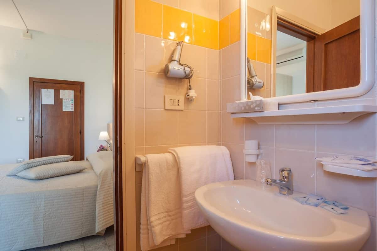 deep-soaking bathtub, free toiletries, hair dryer, bidet