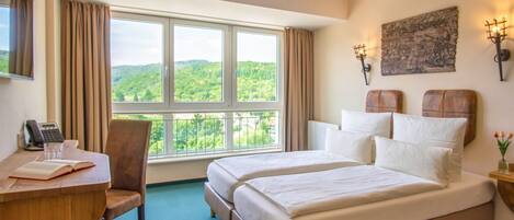Hypo-allergenic bedding, free minibar, in-room safe, soundproofing
