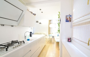 Appartement, 3 chambres | Cuisine privée | Réfrigérateur, micro-ondes, plaque de cuisson, lave-vaisselle