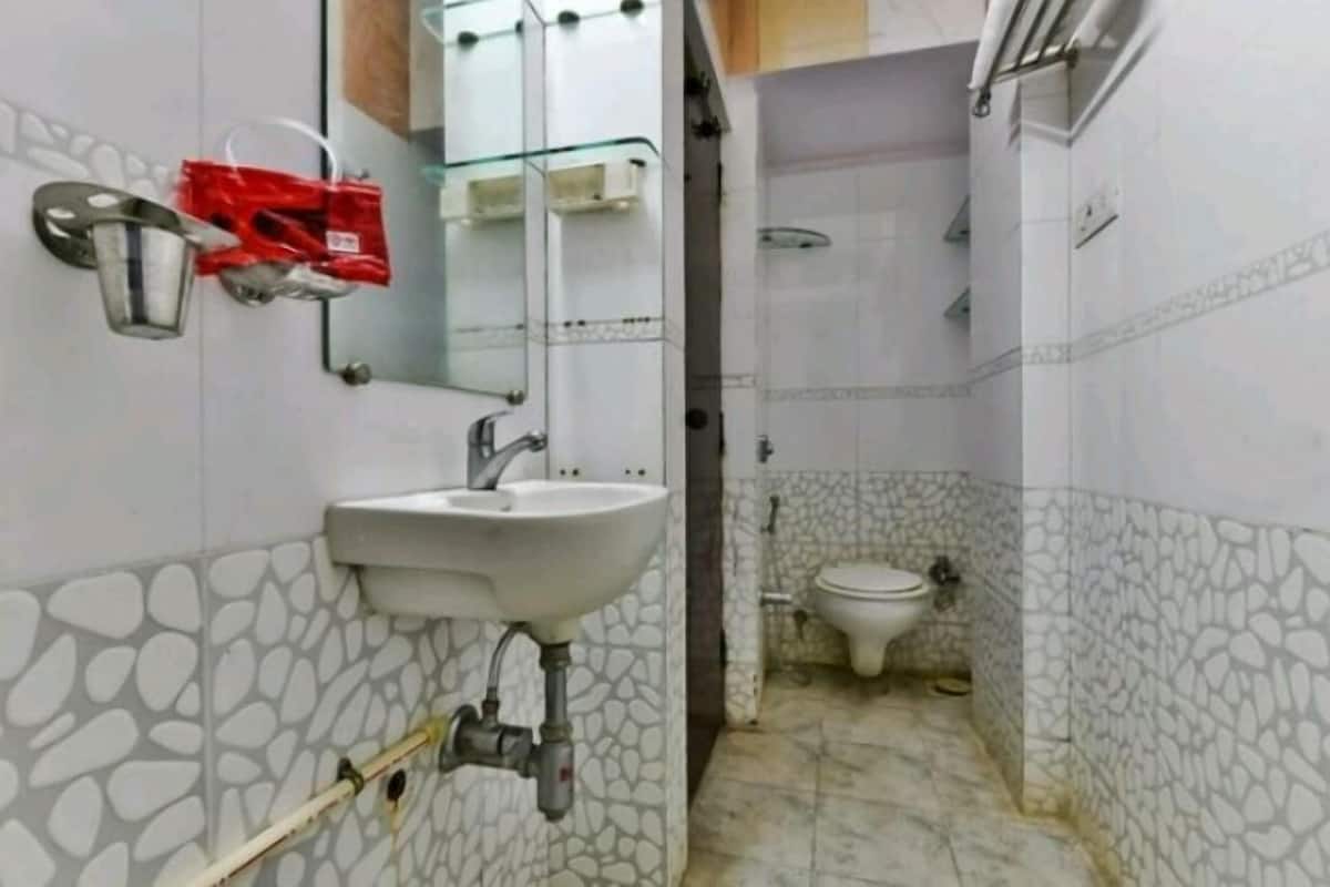 Douche, articles de toilette gratuits, serviettes fournies